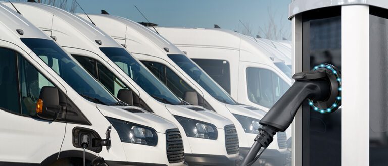 Electric vehicles charging station on a background of a row of v