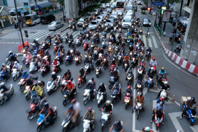 Blurred image of Bangkok rush hour and big traffic jam in the ev