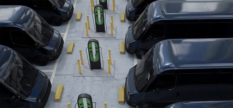 Overhead shot of electric EV delivery vans standing in company parking garage