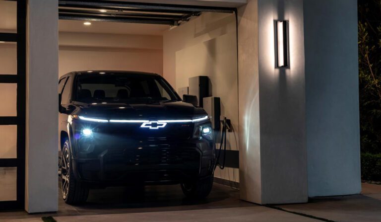 chevy-electric-truck-charging-in-garage-at-night-d