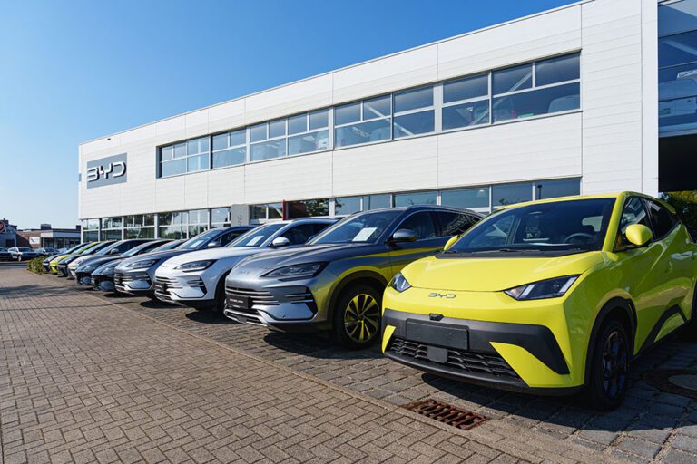 Dusseldorf, Germany – September 28 2025: Row of new BYD cars par