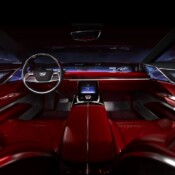 Interior view of the steering wheel, 55-inch pillar-to-pillar advanced LED screen, center console and front seats of the CELESTIQ show car.